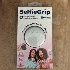 SelfieGrip Collapsible Grip with shudder button Bluetooth. Brand new